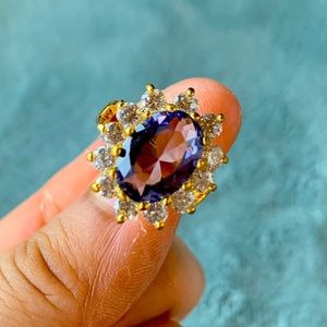 Golden ring w/ diamond accents, amethyst primary